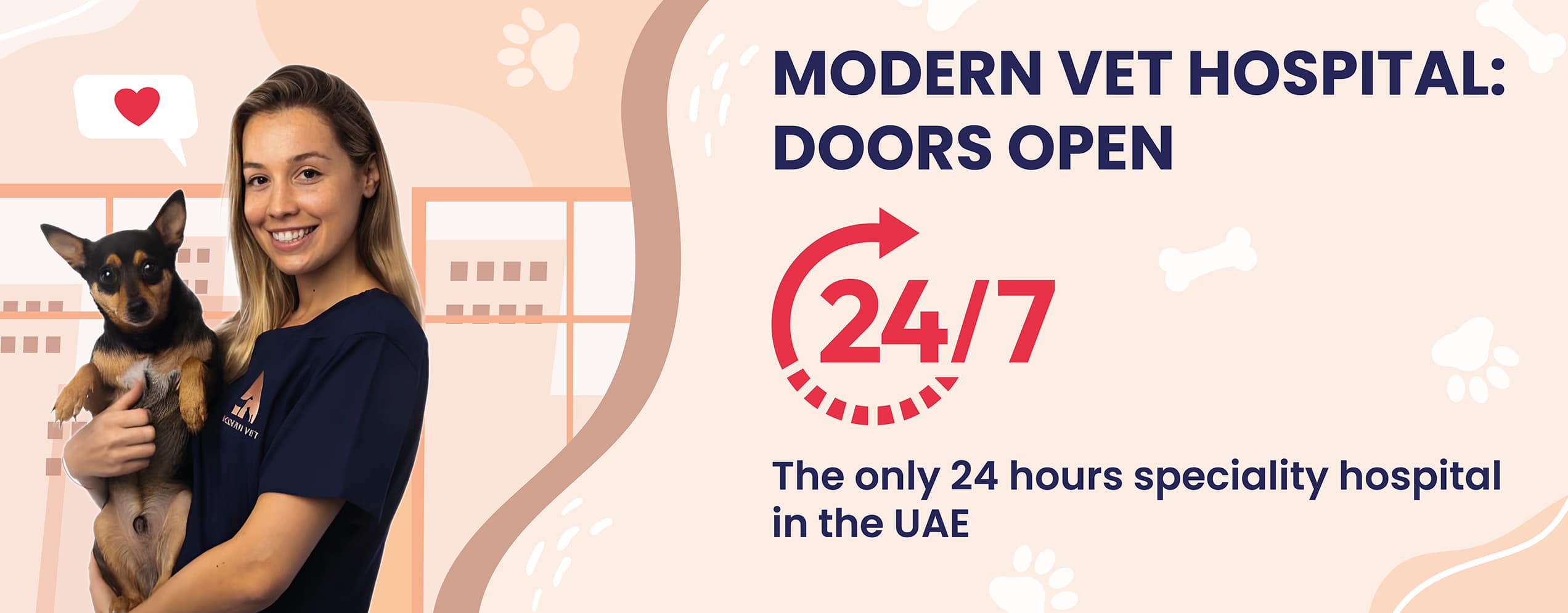 Smiling veterinarian holding small dog at Modern Vet, 24/7 multi-specialty emergency pet hospital in Dubai.